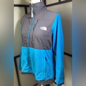 The North Face fleece jacket with 3 pockets. Size M